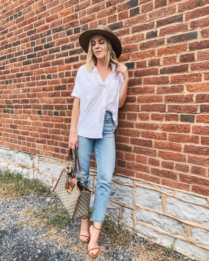 Meagan-Brandon-fashion-blogger-of-Meagans-Moda-wears-oversized-white-button-down-shirt-with-high-waist-mom-jeans-Gucci-bag-and-suede-stiletto-sandals